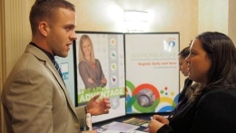 Photo of two attendees speaking intensely